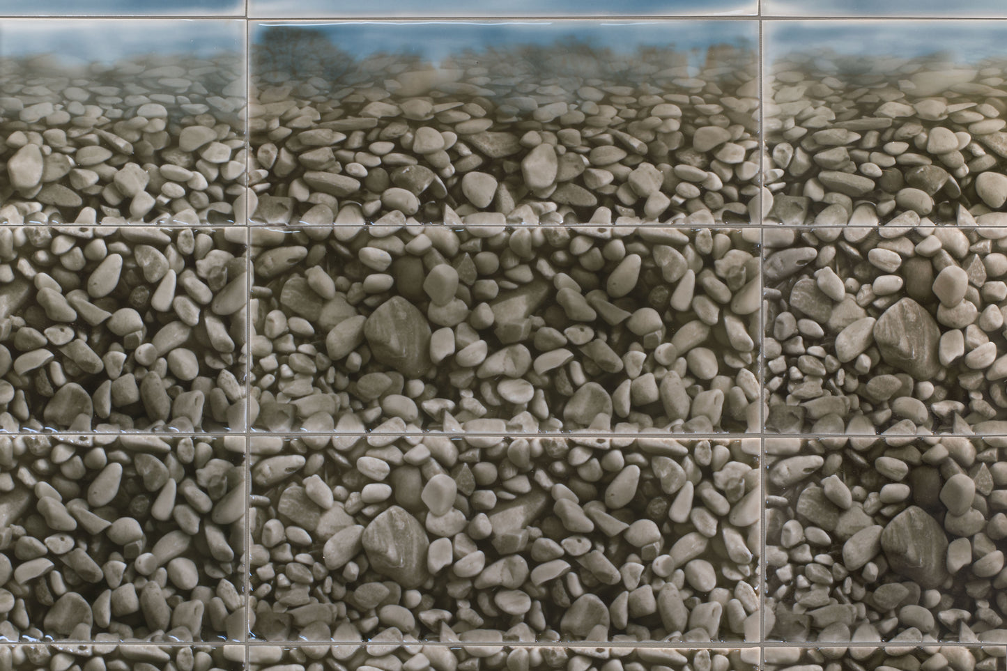 Pebble shower tile design featuring a natural stone pattern, ideal for enhancing bathroom aesthetics with a refreshing ambiance.