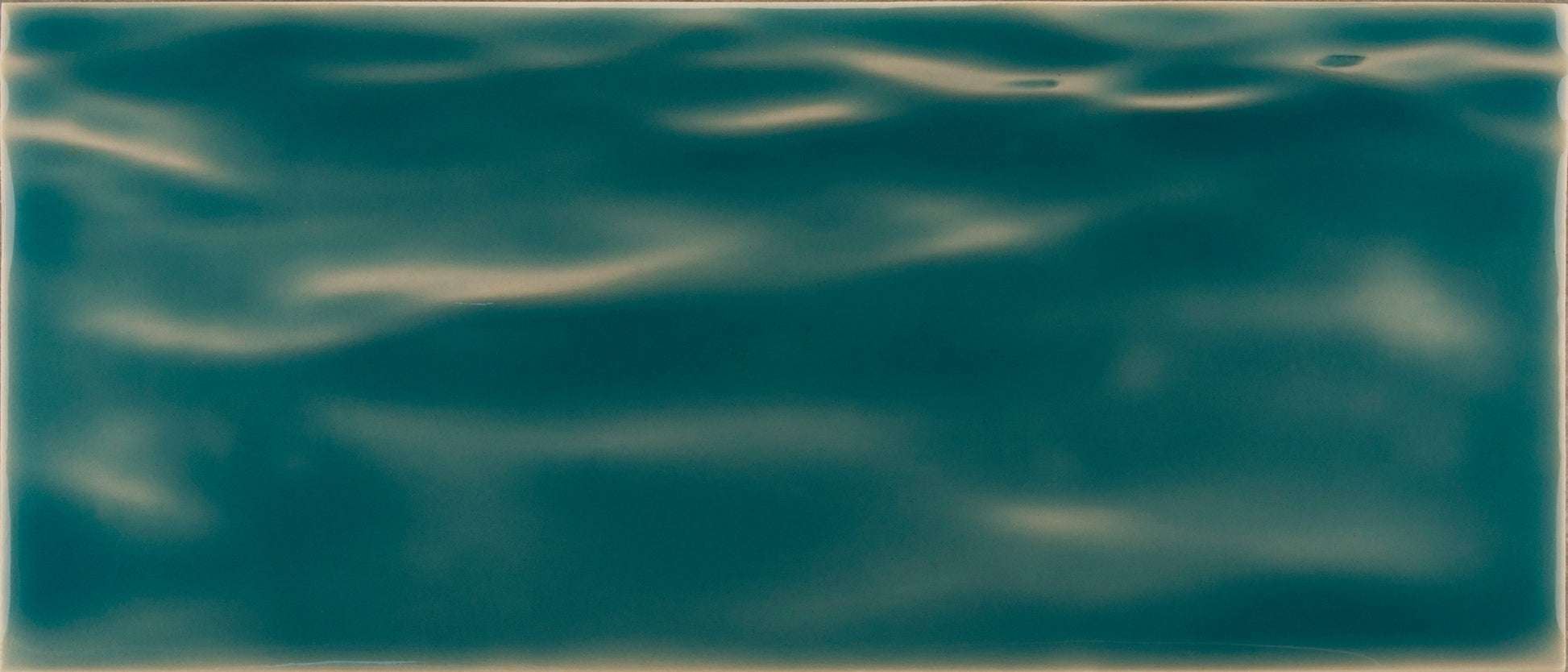 Beach-themed turquoise bathroom tile mural with a water-like texture, ideal for creating a coastal vibe in home decor.