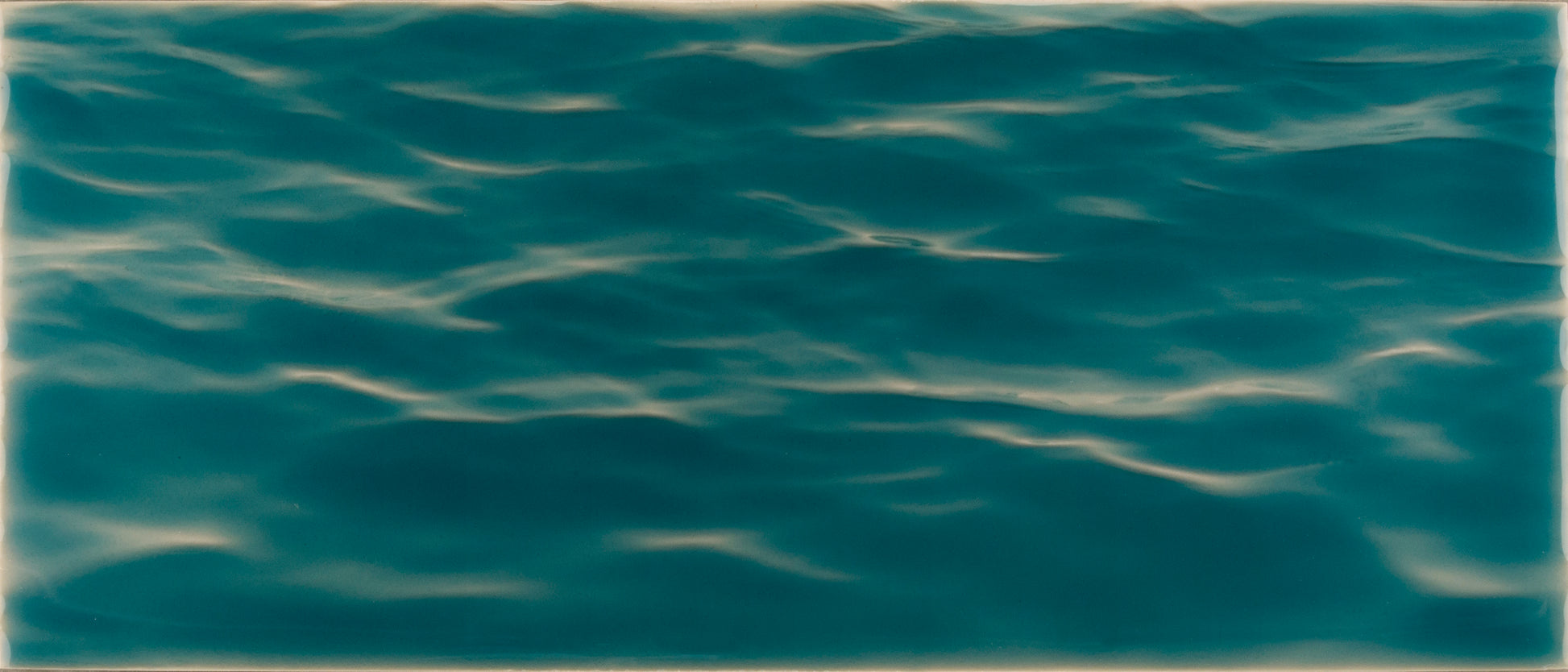 Beach-themed bathroom tile mural featuring tranquil turquoise water surface, creating a coastal vibe for home decor.