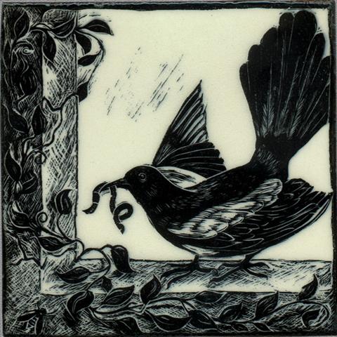 Black and white art tile featuring a bird perched on a branch, holding leaves, from the Black and White Woodcut Series by Living Walls Tile.