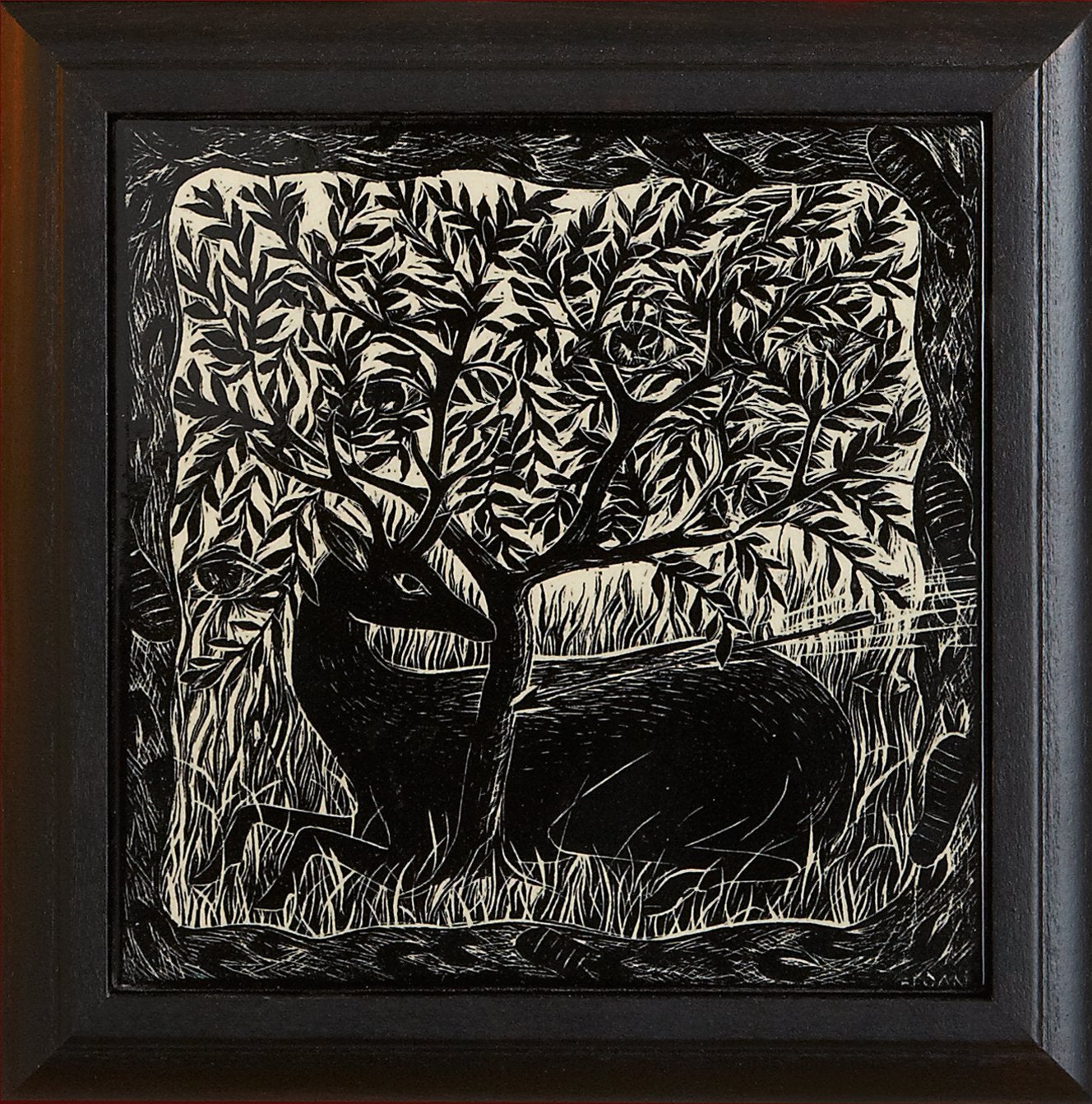 Framed black and white woodcut art tile featuring a deer resting beneath a tree, part of the Black and White Woodcut Series by Living Walls Tile.