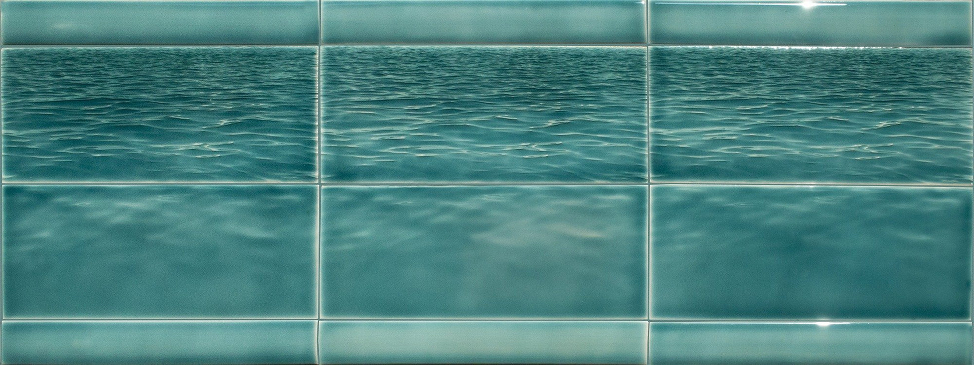 Beach-themed tile backsplash featuring serene ocean water design, ideal for enhancing bathroom decor with a tranquil ambiance.