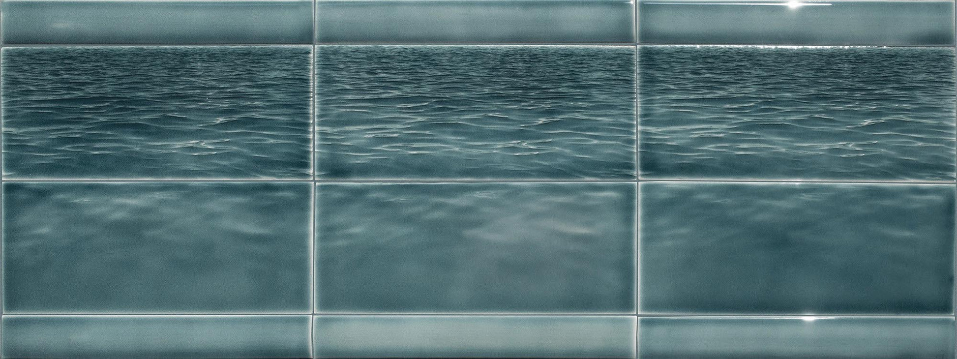 Ocean water-themed tile mural designed for kitchen backsplash, featuring serene blue tones and a textured wave pattern, ideal for beach-themed bathroom decor.