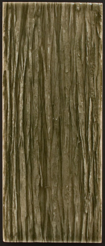 Textured tile resembling natural wood grain, emphasizing biophilic design for luxury bathroom aesthetics by Living Walls Tile.